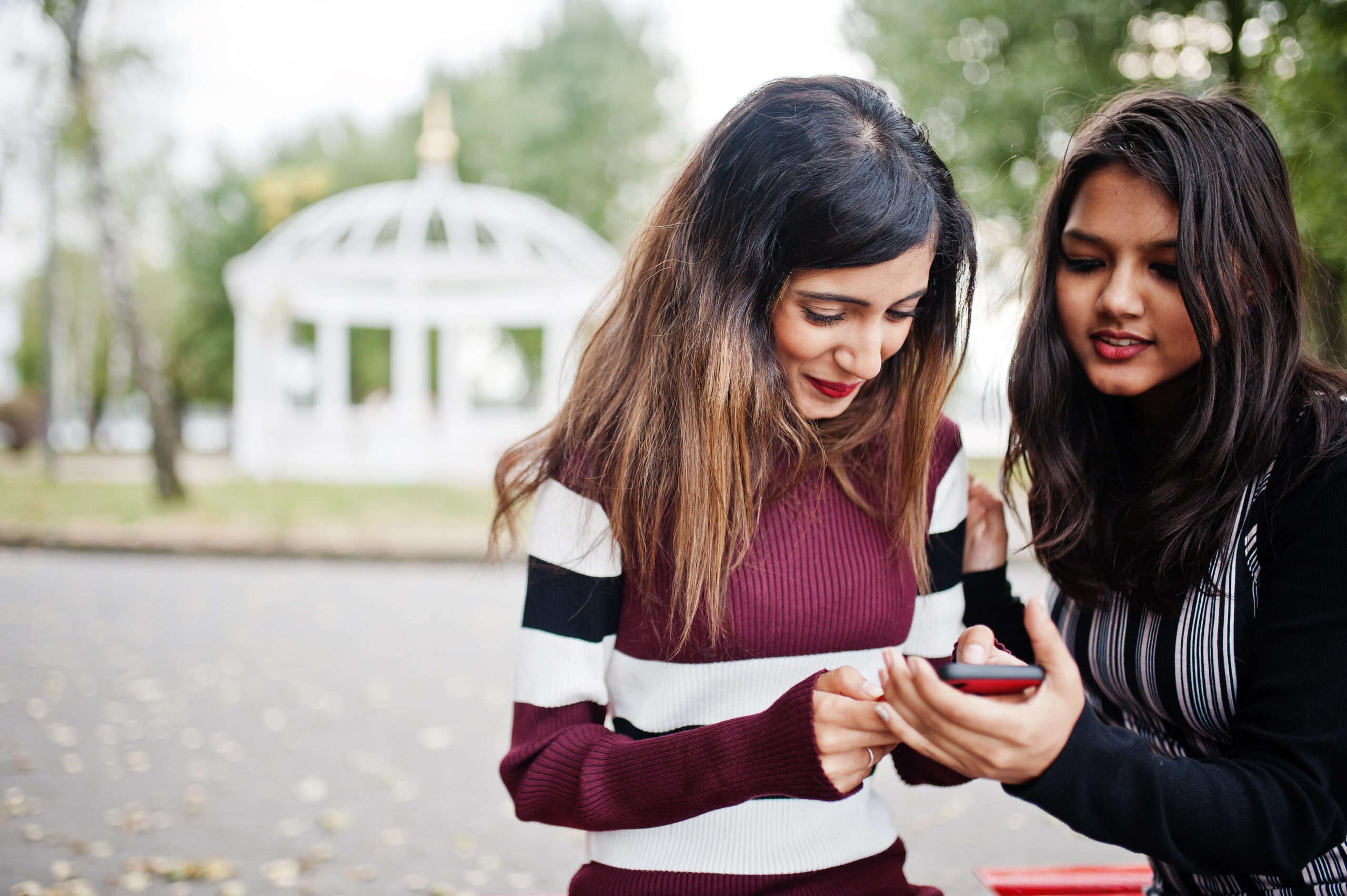Portrait of two young beautiful indian or south asian teenage gi